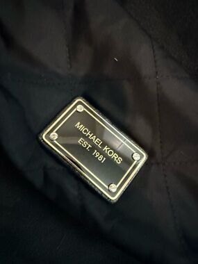 Michael Kors Black and Gold Interior Logo Plaque Cosmetic Bag